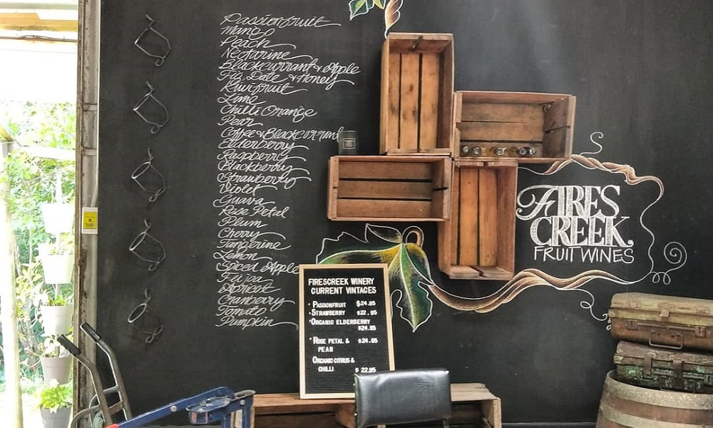 alternative wines listed on blackboard wall