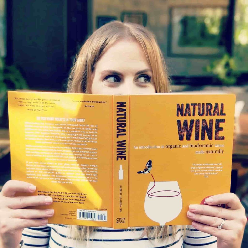 girl reading natural wine book